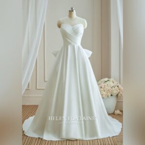 BALL-GOWN WEDDING DRESS WITH PLEATED BODICE AND DETACHABLE BOW